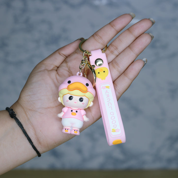 Duck shape Doll Cartoon style keychain with band ( yellow and pink)