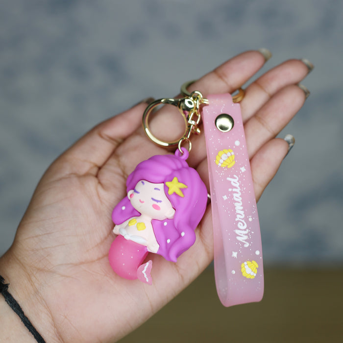 Mermaid Cartoon style keychain with band ( Pink and Purple)