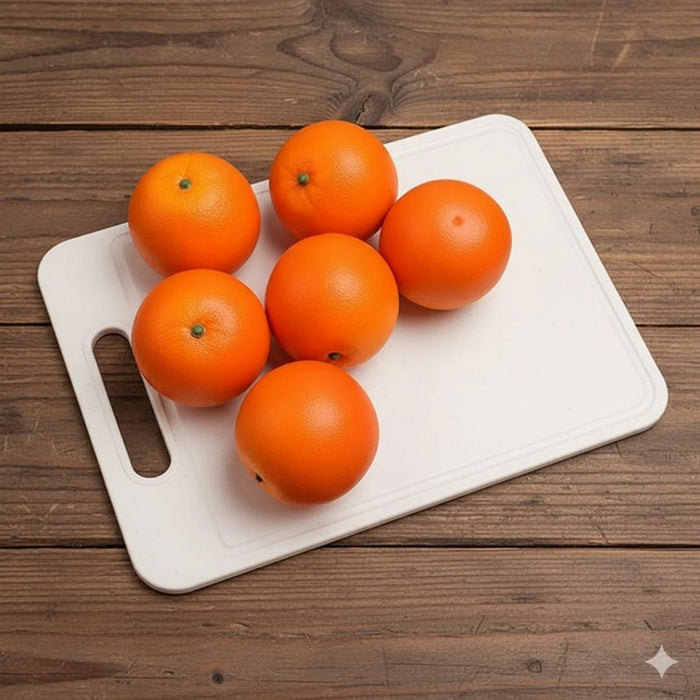 Six realistic artificial oranges set of faux fruit decor.