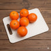 Six realistic artificial oranges set of faux fruit decor.