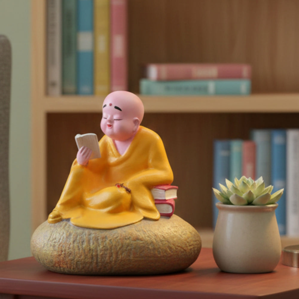 Zen Monk Figurine Reading on Stone