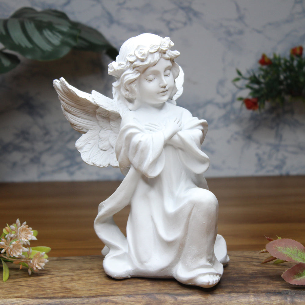 Angel big wings hand on heart, table decoration, home décor