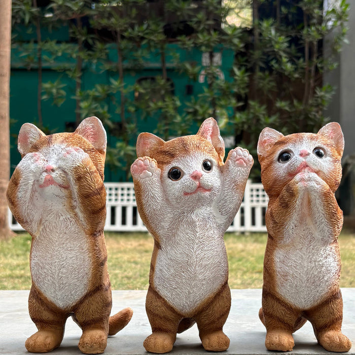 Three wise ginger cat figurines in see hear speak no evil poses, orange tabby cat statues for home decor, funny cat lover gift set.