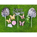 Eight-piece birthday cake topper set on a green background, featuring a silver 'Happy Birthday' sign, two large silver fan toppers, and four iridescent 3D butterfly decorations.