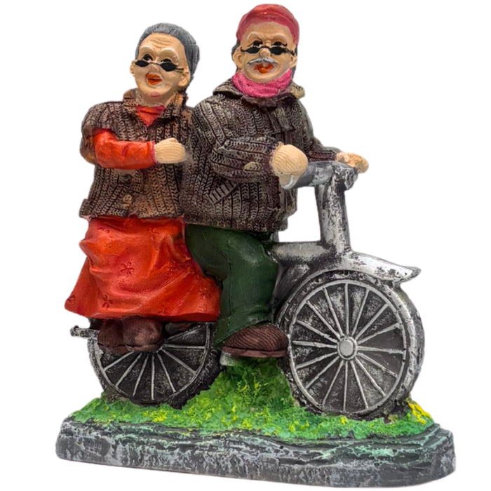 Wonderland Hand-Painted Grandparents on Bicycle Figurine – Sweet Elderly Couple Anniversary Statue – Whimsical Home Decor Tabletop Ornament