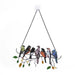 Hanging art piece featuring seven different colourful birds made from stained glass or acrylic, sitting on a black metal branch with green and gold leaves.