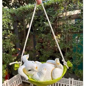 Hanging Rabbit Figurine in Green Hammock for Indoor/Outdoor Decor