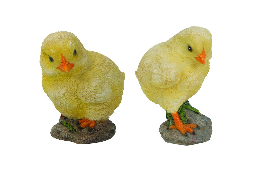 Two adorable yellow chick figurines, one standing on a mossy rock and the other slightly looking down, both with bright orange beaks and feet, isolated on a white background.