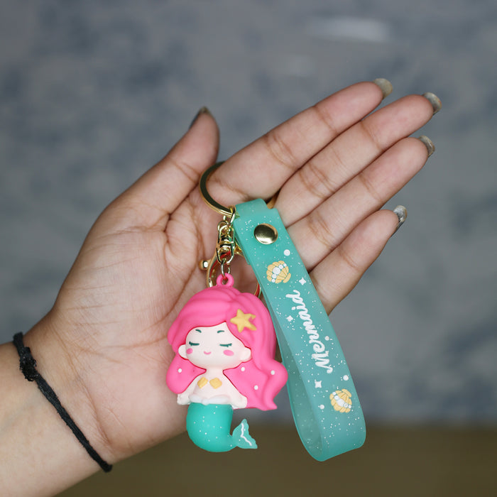 Mermaid Cartoon style keychain with band ( pink and green)