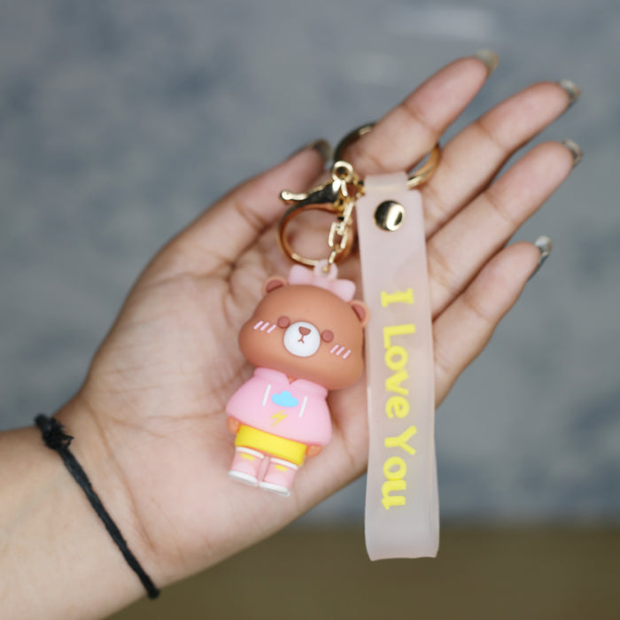 Teddy Cartoon style keychain with band ( yellow and pink)