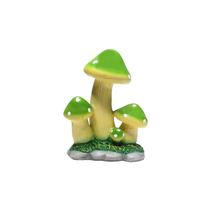 resin mushroom garden décor in green