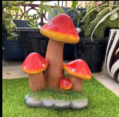 Resin mushroom garden décor in green