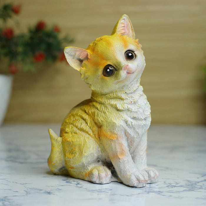 Wonderland resin yellow kitty statue
