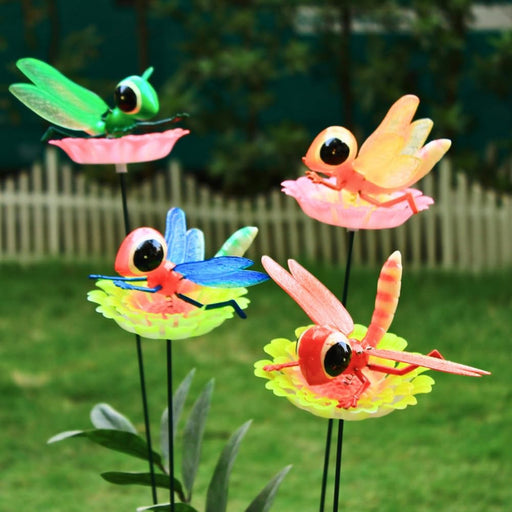 The product comes with metal sticks which you have to attach by yourself with push button . The flowers rotate like windmill in wind or breeze.