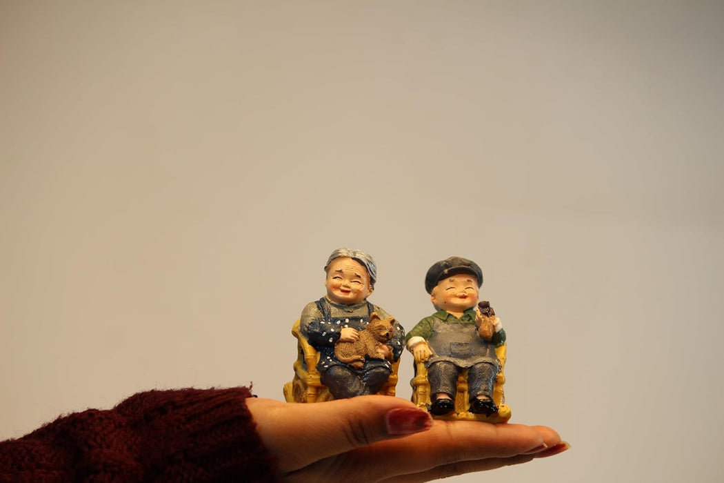 Wonderland Imported Miniatures (set of 1) Grand Parents sitting on chair|Miniature Figurine| Shelf Décor | Resin Home décor | Gift Items