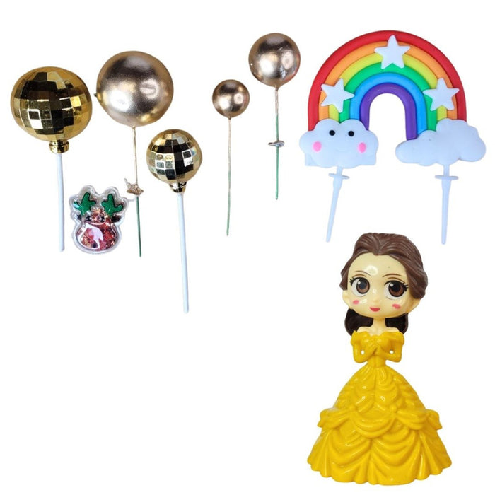 Princess doll cake topper set with yellow gown, brown hair, rainbow, and gold spherical decorations in clear plastic packaging.