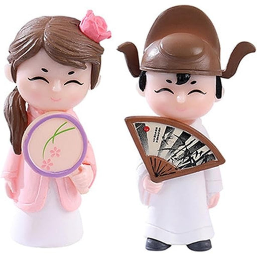 Five pink pig figurines in various poses with gold ingots, a dollar coin, and a 100-dollar bill, symbolizing wealth and good fortune on a white background.