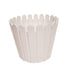 A solid white plastic flower pot designed with a vertical picket fence texture and a tapered round shape, isolated against a clean white background.
