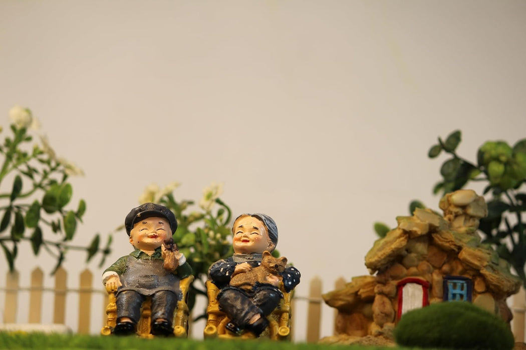 Wonderland Imported Miniatures (set of 1) Grand Parents sitting on chair|Miniature Figurine| Shelf Décor | Resin Home décor | Gift Items