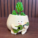 Musical Character Planter – Yellow Pot with Green Guitar – Quirky "Happy Seed" Succulent & Air Plant Holder