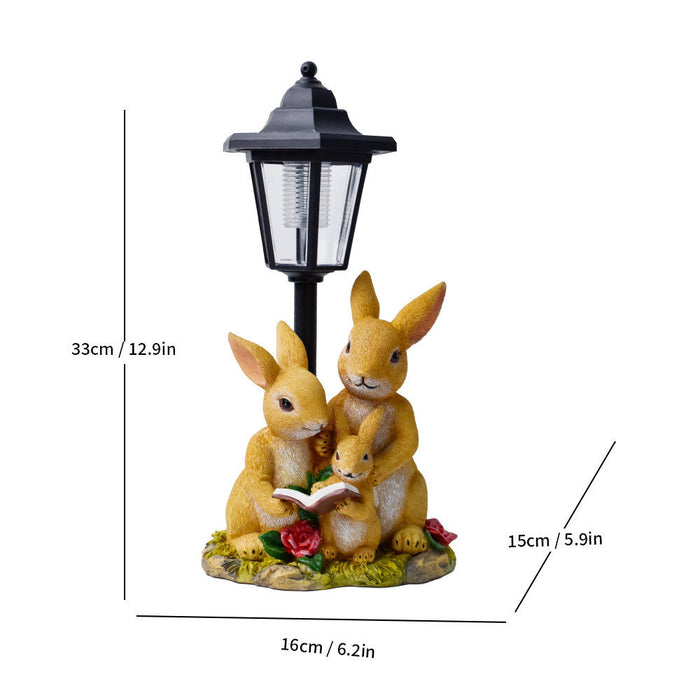 Solar Powered Rabbit Family Garden Statue with Lantern – Whimsical Bunny Reading Figurine for Outdoor Decor, Patio, and Lawn (13-inch)