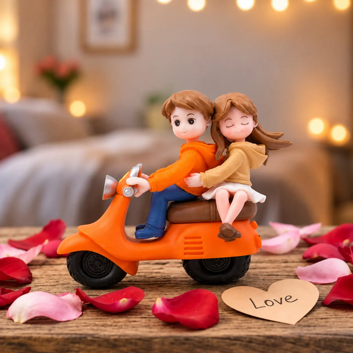 Cute Miniature Couple Riding an Orange Scooter Showpiece for Home Decor, Car Dashboard, and Romantic Gifting