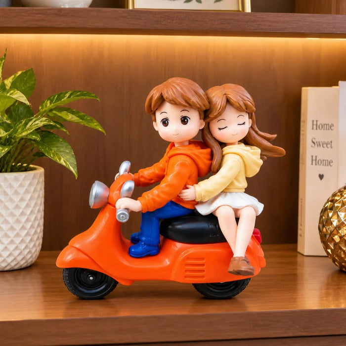 Cute Miniature Couple Riding an Orange Scooter Showpiece for Home Decor, Car Dashboard, and Romantic Gifting