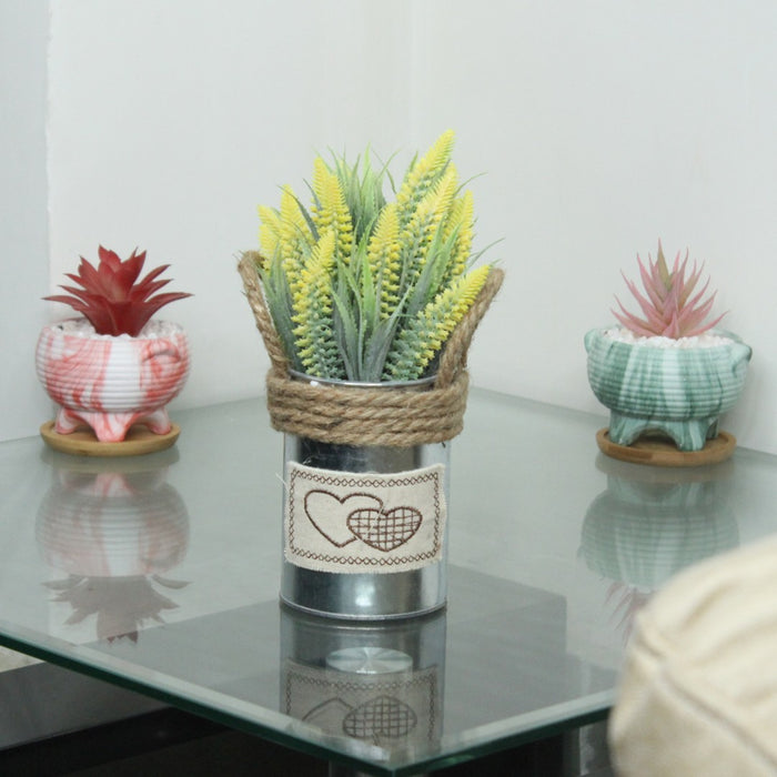 Rustic Heart-Embellished Tin Pot with Faux Yellow and Green Plants