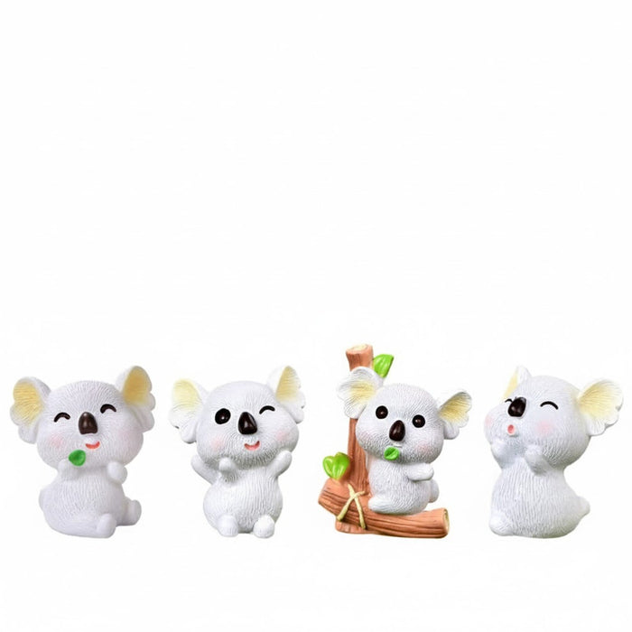 Four small, pink piggy figurines in different cute poses sitting on a dark wooden surface.