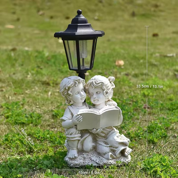 Solar Powered Garden Statue – Boy and Girl Reading Under Vintage Lamp Post – Weatherproof Resin Outdoor Figurine (13.1 Inches)