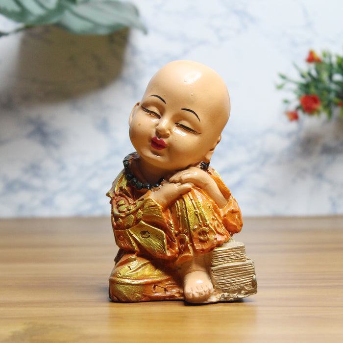 Wonderland Thinking Baby Monk (Orange) statue for Home Décor, showpiece, gift, resin statue