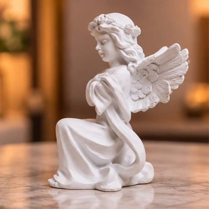 Angel big wings hand on heart, table decoration, home décor