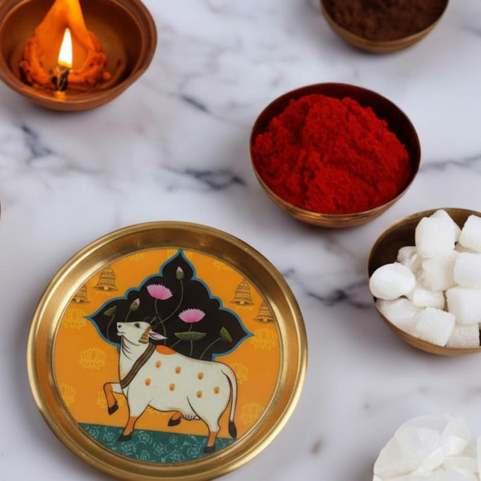 Unique religious Indian souvenir/gift item: decorative tray with sacred cow motif and gold border.