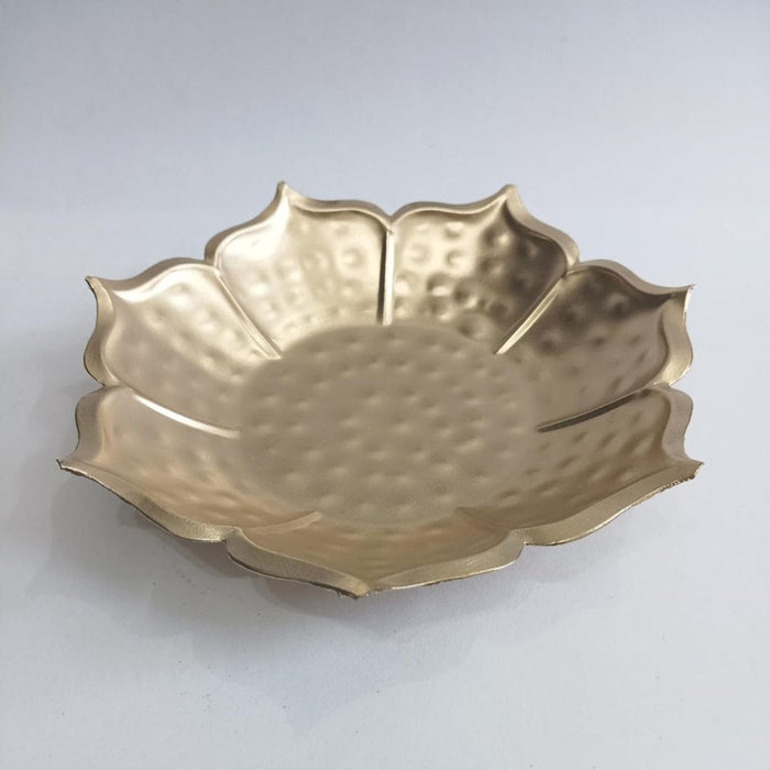 Large gold metal lotus flower shaped decorative plate or Urli. Textured hammered finish centerpiece bowl with scalloped petals. Ideal for floating flowers, serving tray, or festive Diwali, Pooja, and home decor.