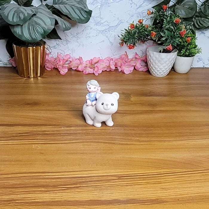 Wonderland  Imported Resin Sitting Baby Boy Sitting on Bear (Blue) | Shelf Décor | Miniature Figurine| Shelf Décor | Resin Home décor | Gift Items