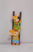 A colorful garden or shelf figurine depicting two yellow rabbits climbing a brown ladder. The top rabbit wears a green apron and is holding a red flower, while the bottom rabbit wears blue overalls and is helping the top one climb.