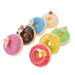 Set of 7 realistic, colorful faux donuts with bright glazes and rainbow sprinkles, suitable for decoration or display.