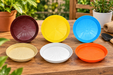 Set of 6 colorful 6 inch plastic plant pot plates and saucers