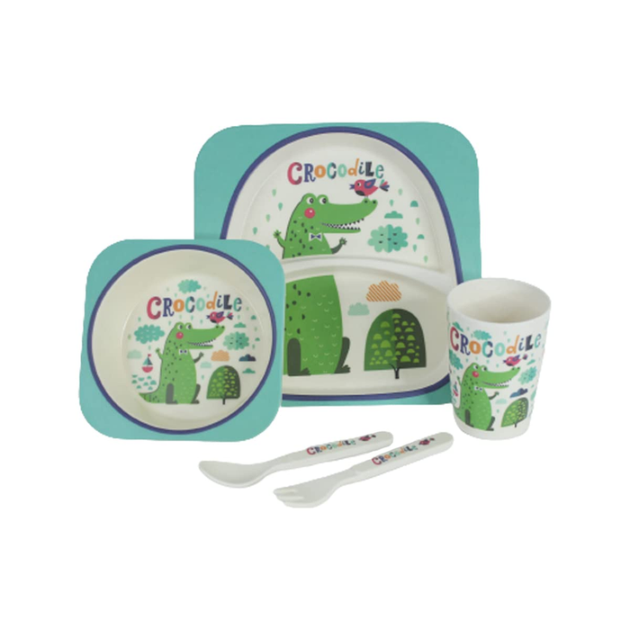 A 5-piece kids' bamboo fiber dinnerware set in a cardboard display box, featuring a teal and white color theme with cute green crocodile and bird illustrations. The set includes a plate, bowl, cup, spoon, and fork.