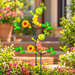 Set of 2 colorful caterpillar garden sticks with flowers and green leaves