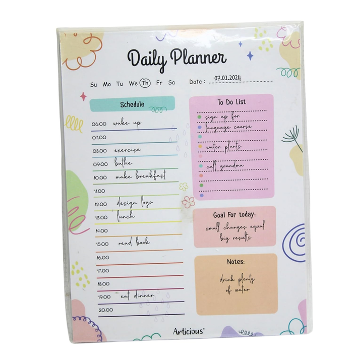 A colorful daily planner notepad titled "Daily Planner" featuring a 24-hour schedule column, a pink to-do list with colored dots, a goal tracker, and a notes section, all decorated with pastel doodles and stars