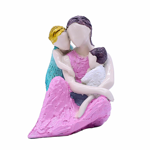 Hand-painted resin figurine of a mother in a pink dress embracing two children in teal and white outfits against a brick background.