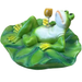 A whimsical green frog figurine reclining on a green lily pad and holding a small yellow cup, isolated on a white background.