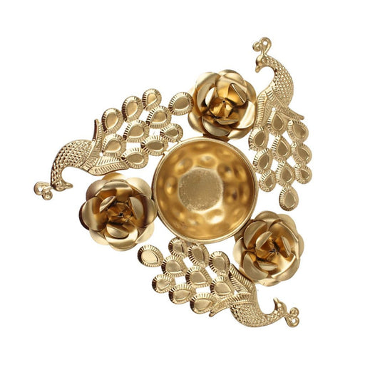 Decorative gold metal Peacock and Rose flower diya stand. Features a central hammered bowl (Urli) surrounded by three sculpted metallic roses and two detailed peacock figures. Ideal for floating candles, diyas, Diwali, and festive home decor centerpiece