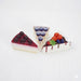 Set of 3 realistic non-edible cake slices with assorted fruit toppings (cherries, strawberries, blueberries, peaches) for decorative display or photography props.