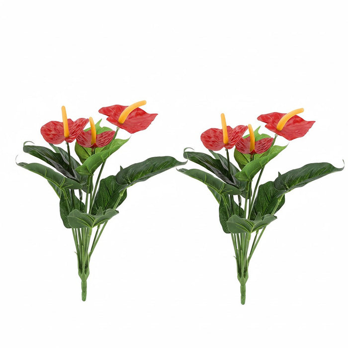 Close-up of a set of two realistic red artificial anthurium plants , showing the waxy texture and vibrant spadix of the faux tropical flowers.