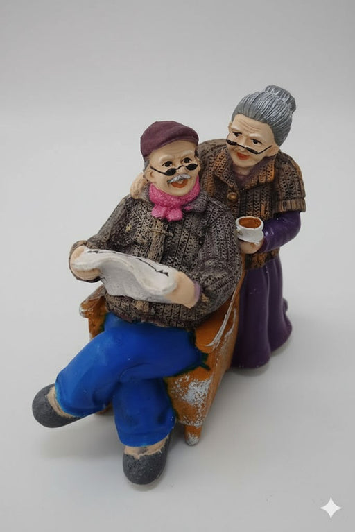 Handcrafted elderly couple figurine sitting on a bench, loving old age resin statue, sentimental anniversary gift for grandparents and parents home decor.