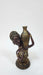 Resin African lady figurine, exotic tribal woman sculpture with gold accents, ethnic tabletop decor for living room.