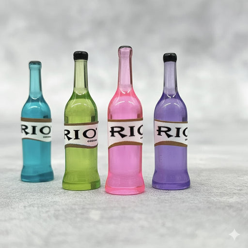 Four miniature resin cocktail or liquor bottle figurines in bright colors: blue, green, pink, and purple, each with a label reading 'RIO', lined up on a gray textured surface.