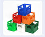 Stack of colorful plastic bottle crates
